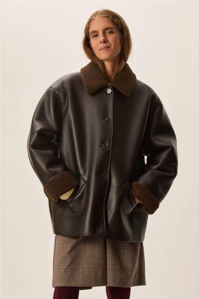 CAZADORA DES PETITS HAUTS... 2